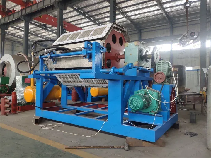 How does an egg tray machine work?